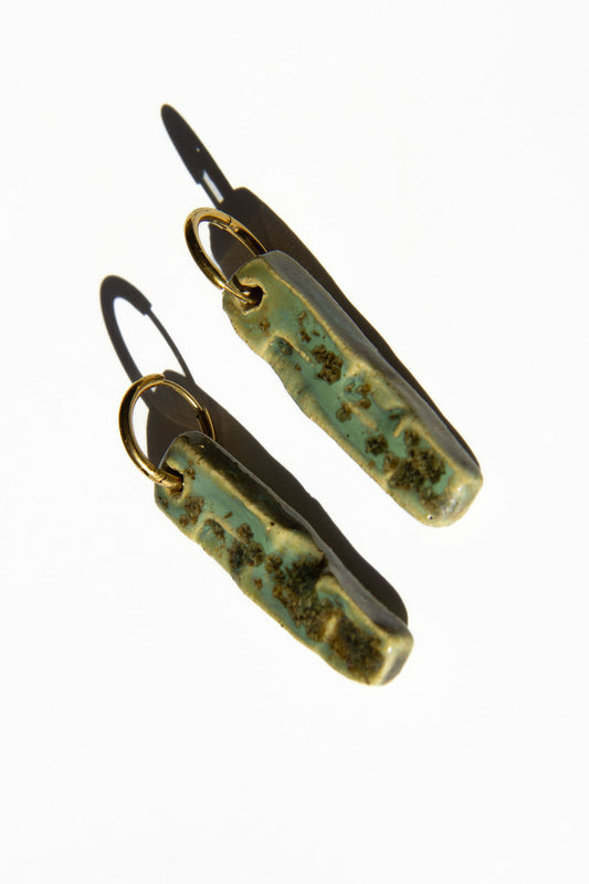 Penha handmade ceramic earrings in Light Green — minimalist rectangular drop, sculpted clay, made in Lisbon Portugal by Jadeo Studio