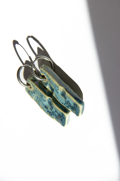 Penha handmade ceramic earrings in Sparkling Blue — minimalist rectangular drop, sculpted clay, statement jewlery made in Lisbon Portugal by Jadeo Studio