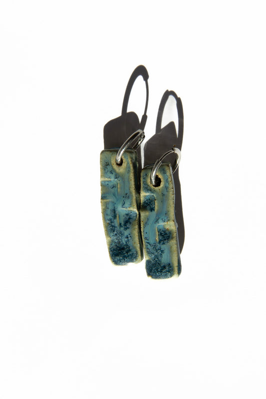 Penha handmade ceramic earrings in Sparkling Blue — minimalist rectangular drop, sculpted clay, made in Lisbon Portugal by Jadeo Studio