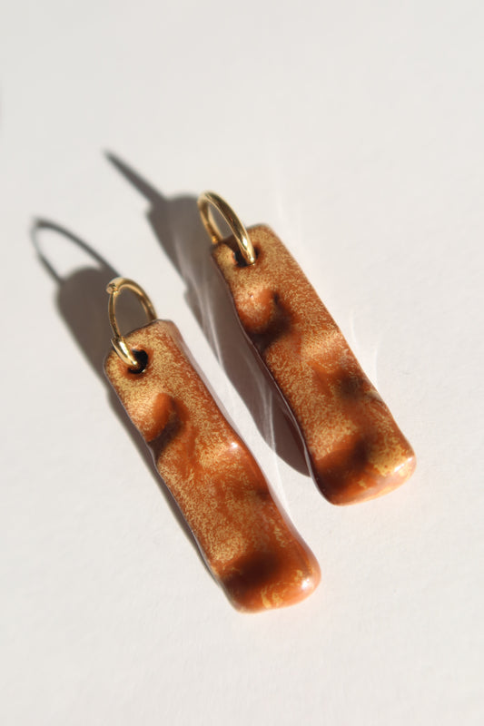 Penha handmade ceramic earrings in Sparkling Brown — minimalist rectangular drop, sculpted clay, made in Lisbon Portugal by Jadeo Studio